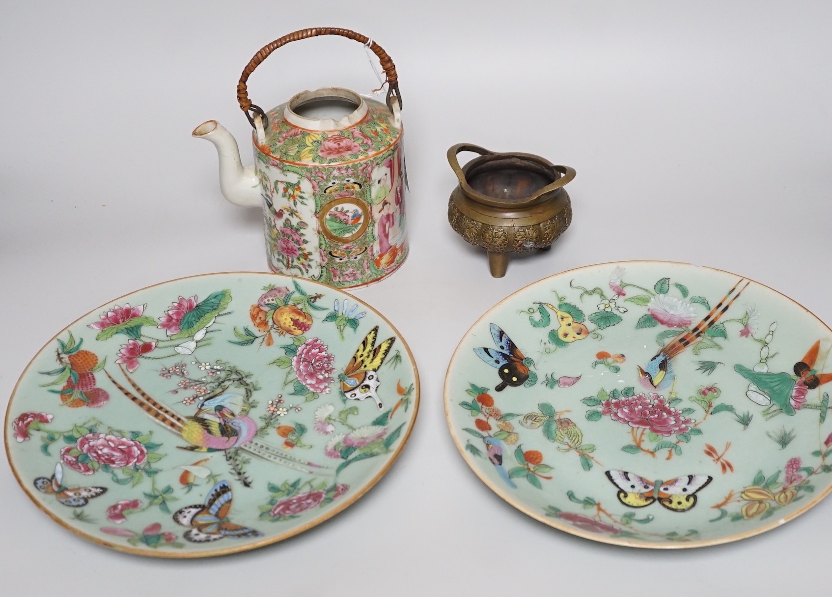 A pair of Chinese celadon ground famille rose plates, a Chinese famille rose tea pot and a bronze censer, plates 26cms diameter